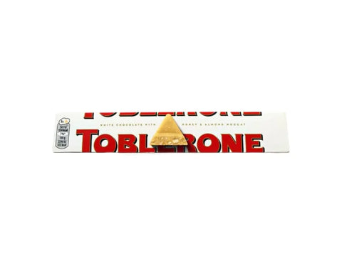 Toblerone white Chocolate With Honey & Almond Nogat 100 gm - CAFELAX